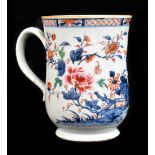 An 18th century Chinese Export ware Famille Rose porcelain mug of baluster form, decorated in a