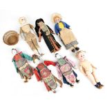 Four French and German bisque head dolls comprising, the French doll with jointed compositon body,