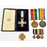 The WWI Distinguished Service Cross, War Medal and Mercantile Marine Medal with corresponding