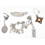 A small collection of hallmarked silver and white metal jewellery including a charm bracelet with