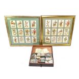 A small collection of assorted cigarette cards, including Player’s examples, also two framed