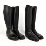 Two pairs of black leather riding boots, height 44.5, length of sole 29cm. Additional
