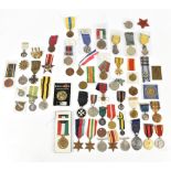 An interesting group of medals including a WWI Victory Medal awarded to 52142 Pte. R. Armstrong