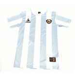 DIEGO MARADONA; a Le Coq Sportif Argentina 1986 retro-style home shirt with embroidered logo,