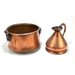 A copper twin handled log bucket with planished decoration, height 38cm, together with a copper