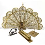 A folding fan shaped fire screen, with cast detailing throughout, height 60.1cm, together with a