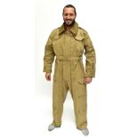 A military-type khaki jump suit.Additional InformationSome stains and discolouration, fraying and