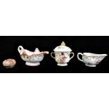 Two 18th century Chinese porcelain Famille Rose sauce boats including an example decorated in a