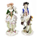 SITZENDORF; a pair of 20th century hard paste porcelain figures representing a shepherd and