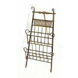 A tubular brass two tier music rack of easel form, height 101cm.