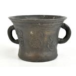 A 16th century bronze twin handled mortar with crowned Tudor Rose decoration in relief, diameter