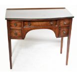 A George III style mahogany bowfront side table, with five drawers, on tapered square legs, height