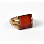 A 9ct yellow gold dress ring set with large carnelian, approx 5.5g.