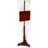 A Victorian mahogany pole screen,