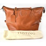 TUSTING; a very large unisex 'Tan Atlantic Explorer' leather travel bag, length 60cm, height 38cm.