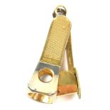 A 9ct yellow gold and base metal cigar cutter with ring loop attachment, length 6cm.