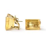 A pair of 14K gold mounted facet cut citrine earrings, stamped 14K,