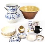 Various items of collectible pottery including a large terracotta mixing bowl with cream glazed