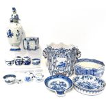 A quantity of blue and white ceramics to include a Delft square planter with panel decoration of