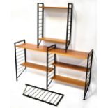 A Ladderax shelving system comprising six black metal supports, seven teak shelves and ten bars,