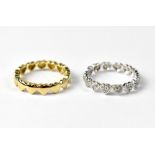 Two 9ct gold fusion rings, a 9ct yellow gold heart ring and a 9ct white gold matching ring,