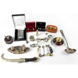 A collectors' lot to include a coin bracelet, a Calibri table lighter,
