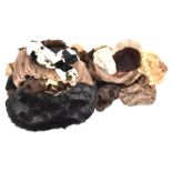 A quantity of fur and faux fur hats, collars and gloves.