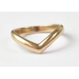 A 9ct gold wishbone ring, size K, approx 2.6g.