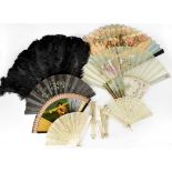 An early 20th century black ostrich feather fan, with simulated tortoiseshell sticks, length 47cm,