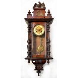 An early 20th century mahogany cased Vienna-style spring-driven wall clock,