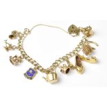 A 9ct gold charm bracelet with eleven gold charms to include a pair of slippers, Aladdin's lamp,