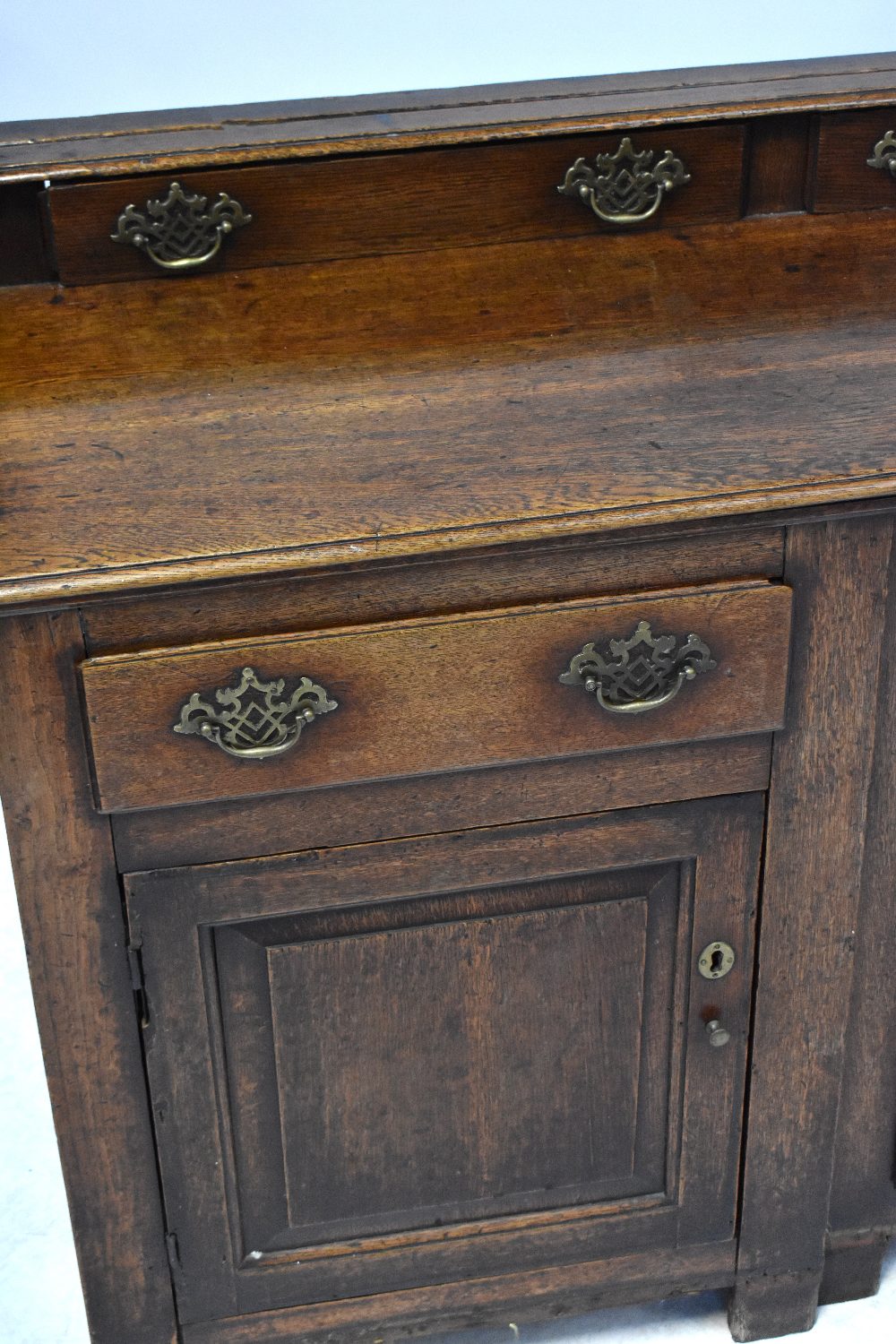 A George III style oak break-front sideboard comprising galleried back of three drawers above - Image 4 of 5