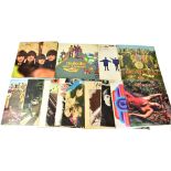 A large collection of vinyl albums including ten Beatles albums, Rolling Stones, Sad Café,