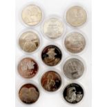 Eleven encapsulated commemorative coins, £2 and one crown,