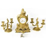 A late 19th French century gilt metal clock garniture,