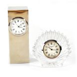 A miniature Waterford clock, the surround in the form of a crystal shell,