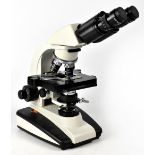A Pryor Scientific Instruments binocular microscope with illuminated base, Model PX032, height 40cm.