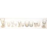 A large collection of drinking glasses to include a 19th century penny lick,