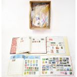 Four amateur stamp albums, various first day covers and loose stamps.