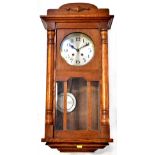 An oak cased regulator WALL clock,