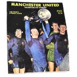 MANCHESTER UNITED; an official team guide, team photo to the reverse fully signed,