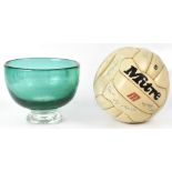 A large green glass footed bowl titled to one side 'To Commemorate the 100th Football League Season