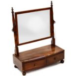 A 19th century mahogany rectangular swing dressing table mirror, turned baluster supports to mirror,