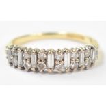An 18ct gold diamond half eternity ring,