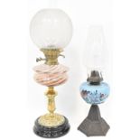 An Edwardian brass oil lamp with etched glass shade,