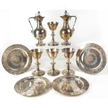 An Elkington & Co silver plated Communion set comprising a pair of wine ewers, height 32cm,