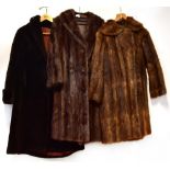 Two vintage fur coats, each with brown satin lining and a faux fur example (3).