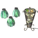 A Tiffany style lamp on wrought iron stand and three modern green stained glass effect lamp shades
