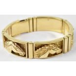 A 9ct yellow gold gentlemen's bracelet with four rectangular sections,