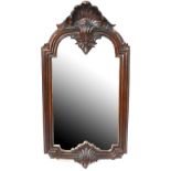 A Victorian mahogany rectangular bevel edged wall mirror with shell decoration to the top of the